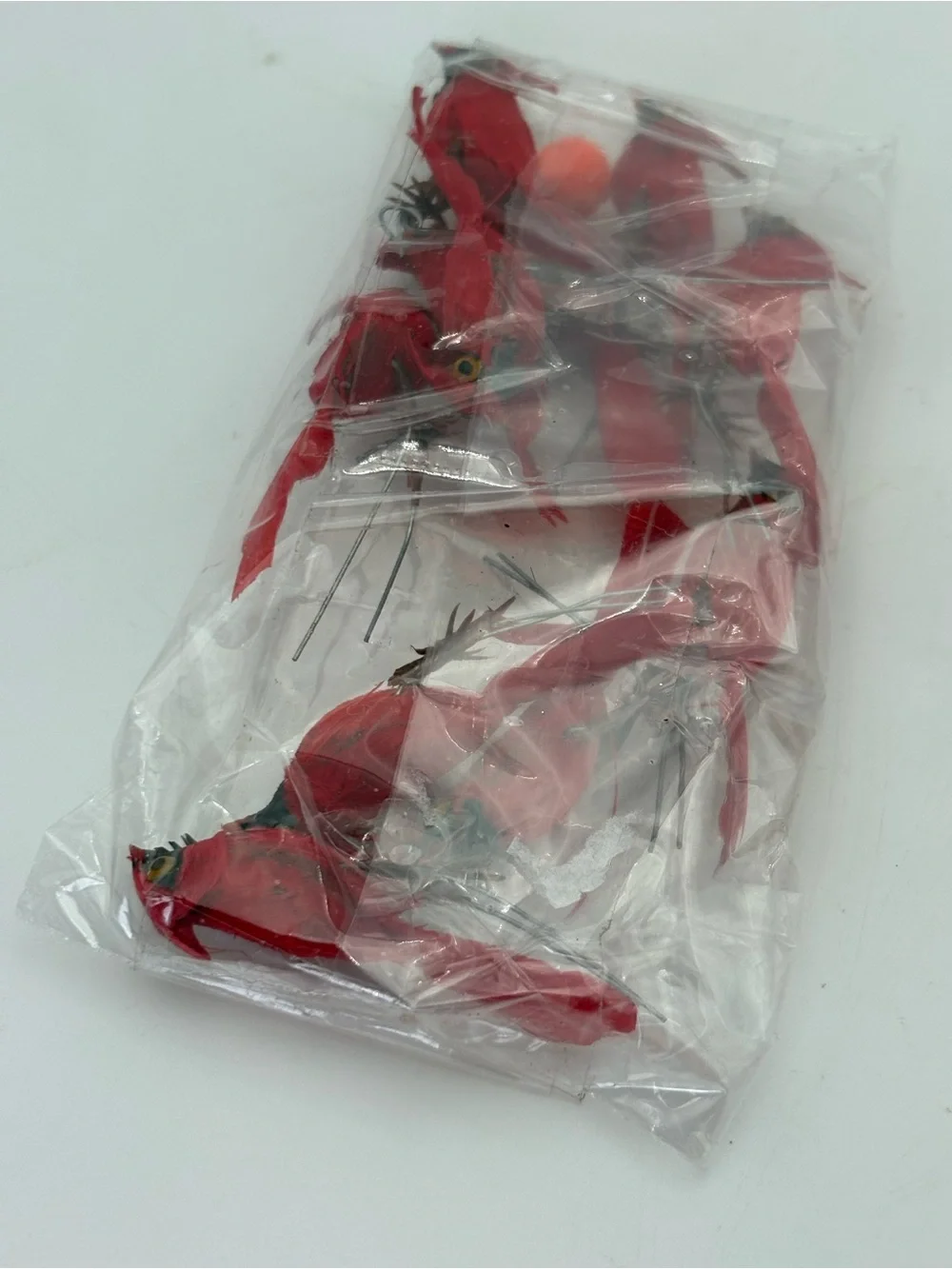 11 Crafting Redbirds with Feathers and Metal Twist Connectors